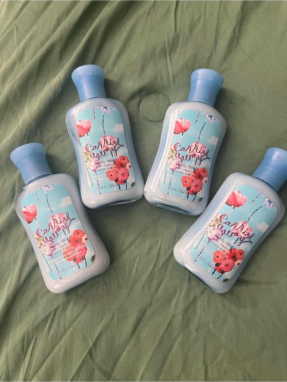 “Carried Away” Bath and Body Works Lotion - set of 4 (travel size - 3 oz)